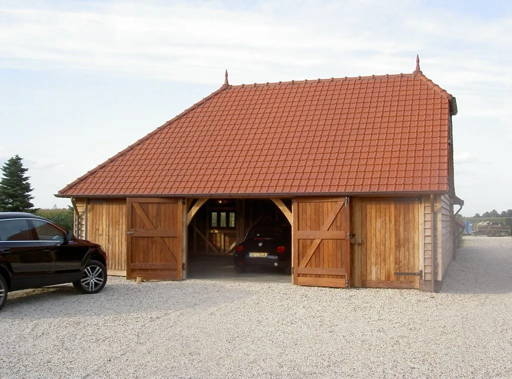 Eiken bijgebouw met garage en tuinkamer