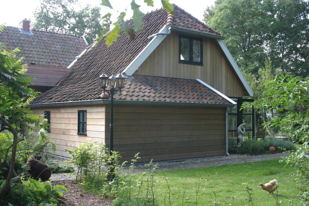 Eiken aanbouw met fitness, sauna en wellness